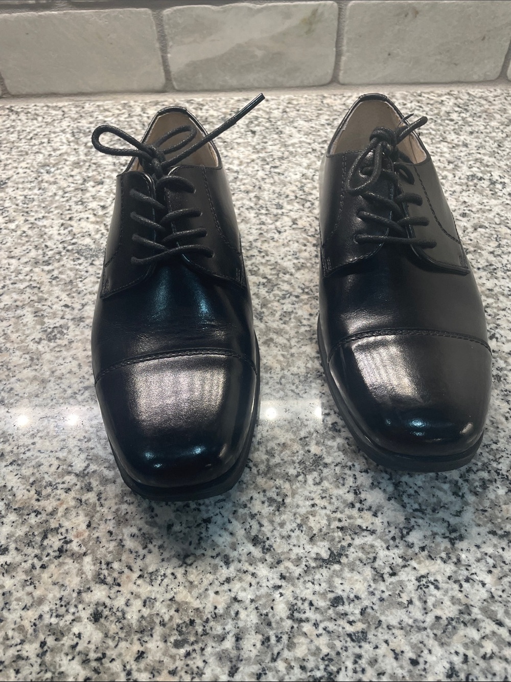 Johnston & Murphy Black Cap-Toe Leather Oxfords
